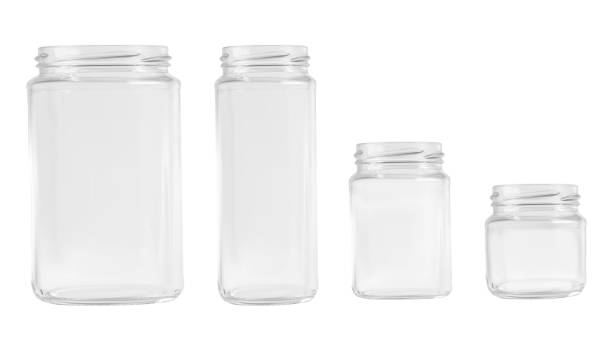 istock Kit. transparent glass jars of different shapes and sizes. on an empty background. 1744803717