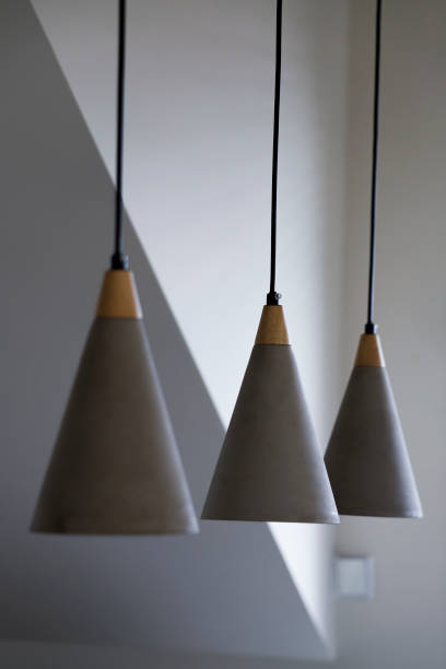 istock Set of three modern ceiling lights in the living room. 1744806147