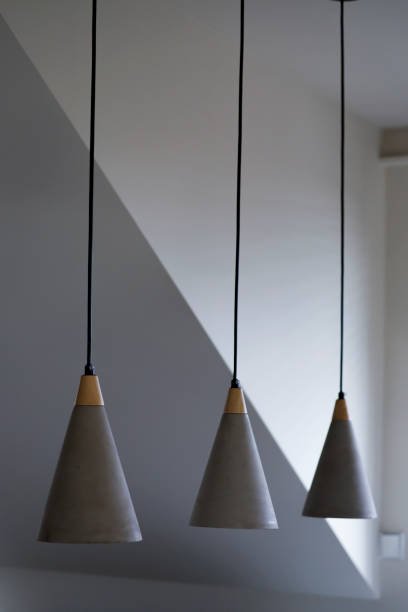 istock Set of three modern ceiling lights in the living room. 1744806663