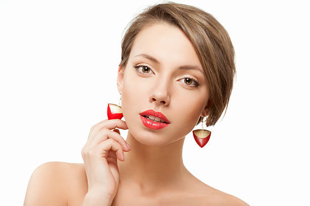 Beautiful young woman with red lips stock photo