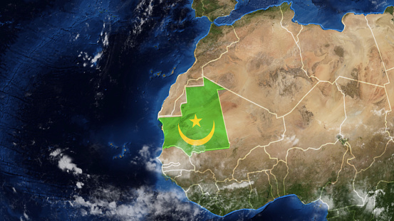 Credit: https://www.nasa.gov/topics/earth/images\n\nAn illustrative stock image showcasing the distinctive flag of Mauritania beautifully draped across a detailed map of the country, symbolizing the rich history and cultural pride of this renowned European nation.