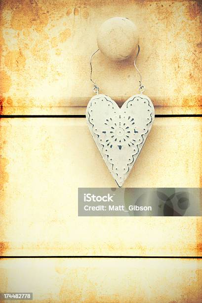 Retro Cross Processed Image Of Heart On Wooden Background Stock Photo - Download Image Now