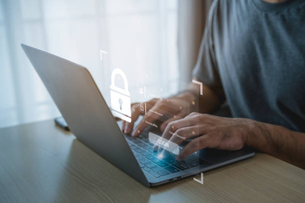 istock Businessman key password to login laptop to access, information security and encryption, secure access user's personal information, Internet access, cybersecurity. Cyber security technology concept. 1744838294