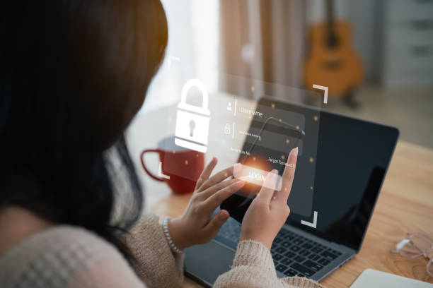 istock Businesswoman use mobile phone and laptop to access, information security and encryption, secure access user's personal information, Internet access, cybersecurity. Cyber security technology concept. 1744838295