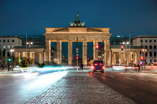 illuminated Brandenburg gate in Berlin at blue hour