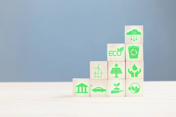 istock wood block with icon reduce co2,and reduce global warming,climate change,ecology friendly investment,ESG environment social governance,Green Business Innovation and Sustainable Development concept. 1744893887