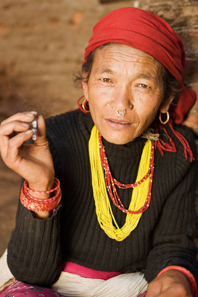 istock Nepali woman smoking cigarette. Bhaktapur. 174491373