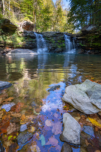 Mill Creek Falls in Hawks Nest State Park during the fall season in the Appalachian Mountains of West Virginia, USA.