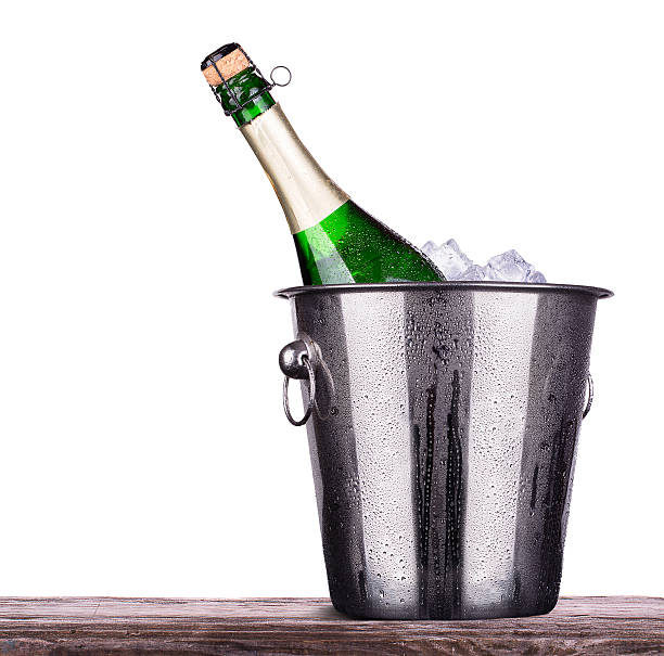 istock bottle of champagne in ice bucket 174491877