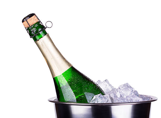 istock bottle of champagne in ice bucket 174491969