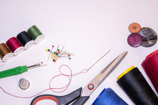 Sewing tools on a light background.