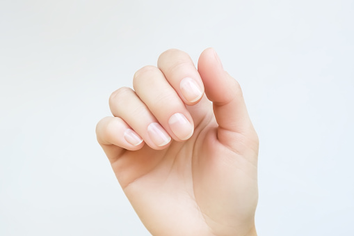 female hand with natural healthy nails