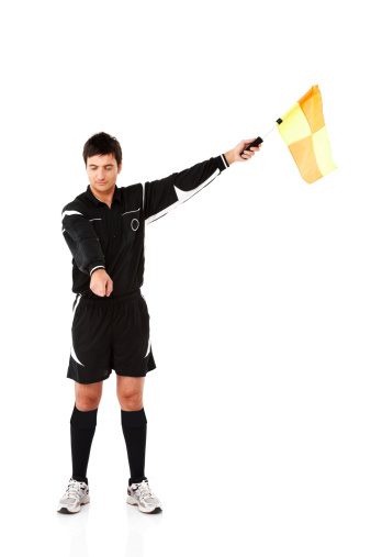 Image of football official signals a penalty with a colorful flag isolated on white background