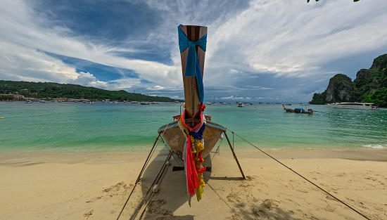Phi Phi island one of the wonders of beauty just off the coast of phuket thailand. Phi phi island is famous for turquoise clear blue waters teaming with Corel reef fish white soft sand