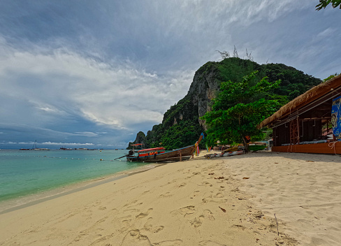 Phi Phi island one of the wonders of beauty just off the coast of phuket thailand. Phi phi island is famous for turquoise clear blue waters teaming with Corel reef fish white soft sand