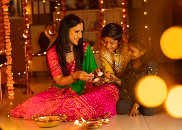 istock Mother with children decorating plate at home 1744987018
