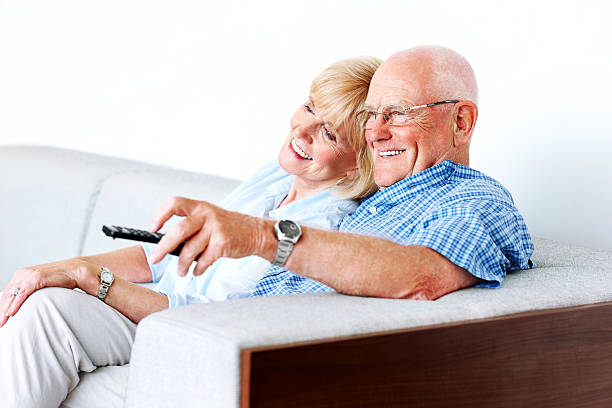istock Relaxed senior couple watching television 174499324