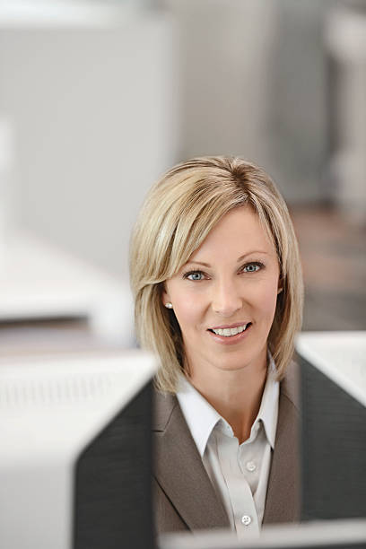 istock Business woman working in a cubicle 174500043