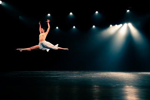 Teenager performing contemporary dance. Canon Mark IV.