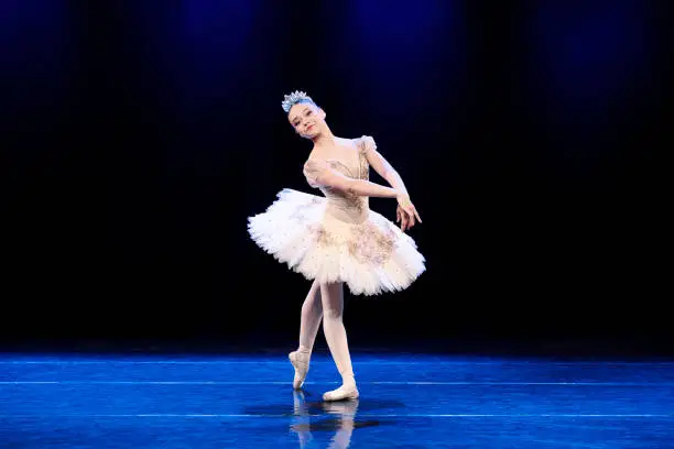 Photo of Young teenager dancing Dulcinea role on Don Quixote ballet