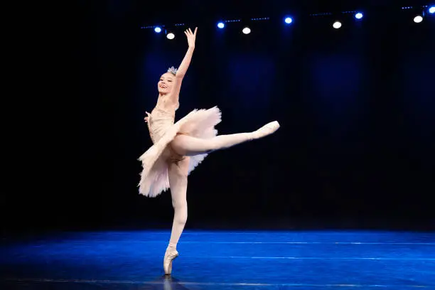 Photo of Young teenager dancing Dulcinea role on Don Quixote ballet