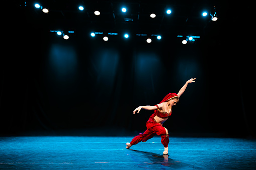 Young girl dancing the principal role of Nikiya, The Temple Danver ballet. La Bayadère. Canon Mark IV.