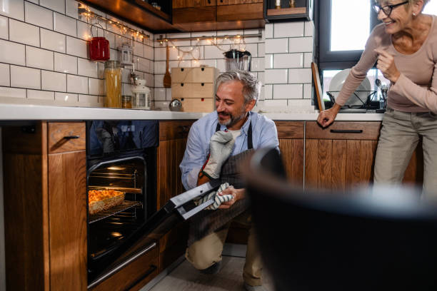 istock A husband and a wife are baking together in the kitchen 1745008047