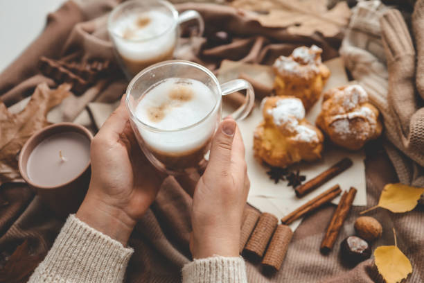 istock Cup of coffee in hands, cozy autumn 1745020970