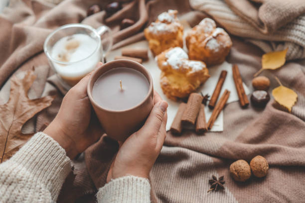 istock Cup of coffee in hands, cozy autumn 1745027907