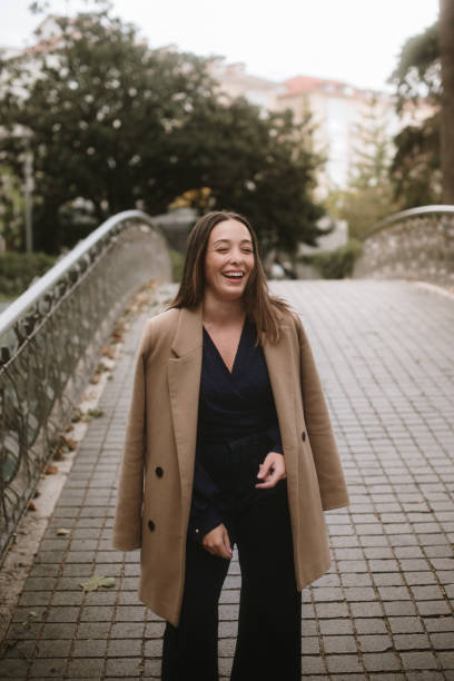 istock Cheerful woman with autumn clothes 1745039205