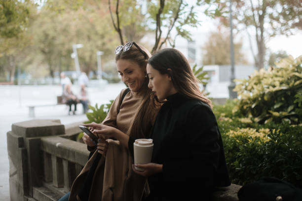 istock Two young women with smart phone 1745050530