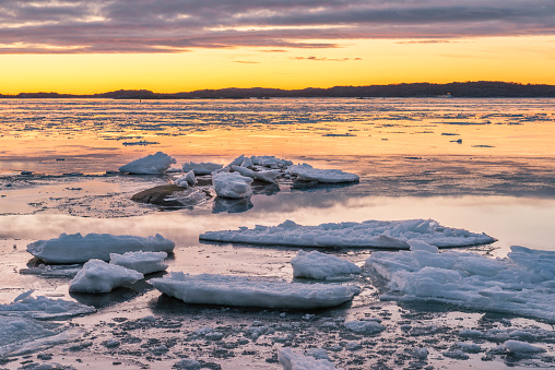 Winter sunset at the coastline of Fiskeback in Gothenburg, Sweden.