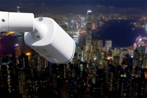 istock CCTV Camera Operating with city in background. 1745075012
