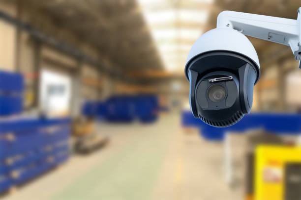 istock CCTV Camera or surveillance operating inside industrial factory. Copy space. 1745075563
