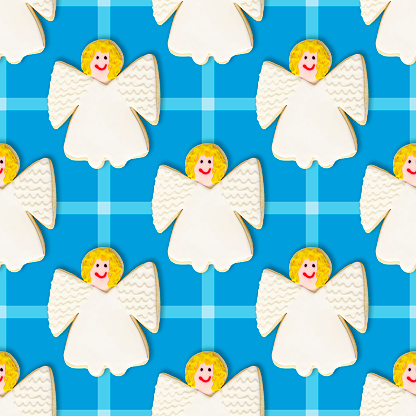 A Christmas Cookie Repeating Pattern Background Wallpaper has been created using festive decoratively iced Christmas Cookies