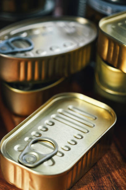 many ring-pull cans - focus on foregound