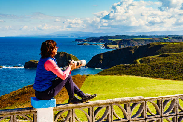 istock Tourist with camera on Asturias coast, Spain 1745175184