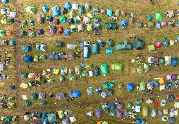 istock Tents camp, top view. Rest with a tent in nature. 1745179546