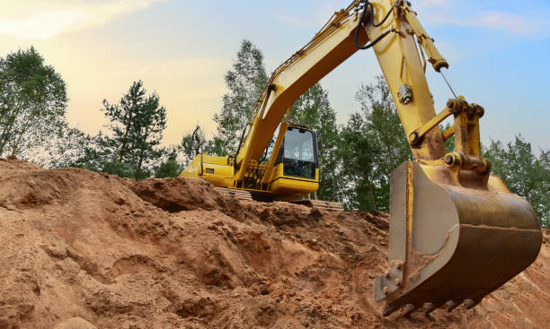 istock Excavator on earthmoving in open pit mining. Backhoe dig sand and gravel in quarry. 1745180567