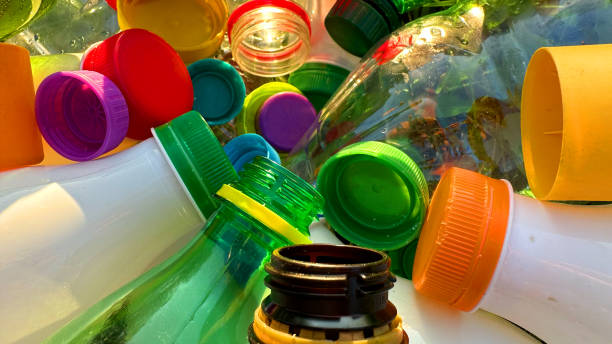 istock Plastic Recycling. Water bottles and plastic Bottle Caps for Recycling. 1745181189
