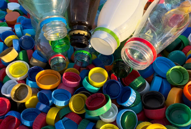 istock Plastic Recycling. Water bottles and plastic Bottle Caps for Recycling. 1745182288