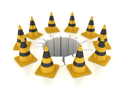 Traffic Cones Around Hole - White Background - 3D rendering