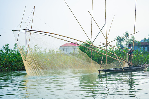 15th August 2023 Tanguar Haor, Sunamganj, Sylhet, Bangladesh. Fisherman fishing with their fishing net.