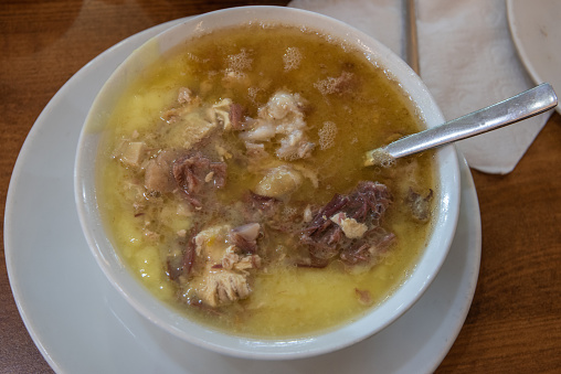 Soup of boiled sheep parts, including, head, brain, feet and stomach.