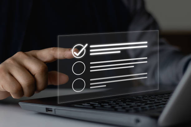 istock Survey form concept. The questionnaire with checkboxes and people fill out the survey form online and answer questions on a test. Education futuristic technology and learning concept. Satisfaction. 1745241022