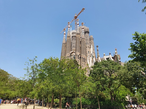 BARCELONA, SPAIN - May 15, 2022: view of the famous Sagrada Familia the largest unfinished Catholic church in the world