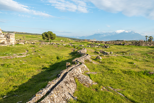 Ancient irrigation system at Hierapolis site in Pamukkale, Turkey. Hierapolis was an ancient Greek city located on hot springs in classical Phrygia in southwestern Anatolia.