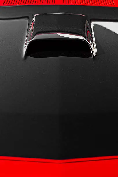 Abstract detail from the bonnet of an American muscle car
