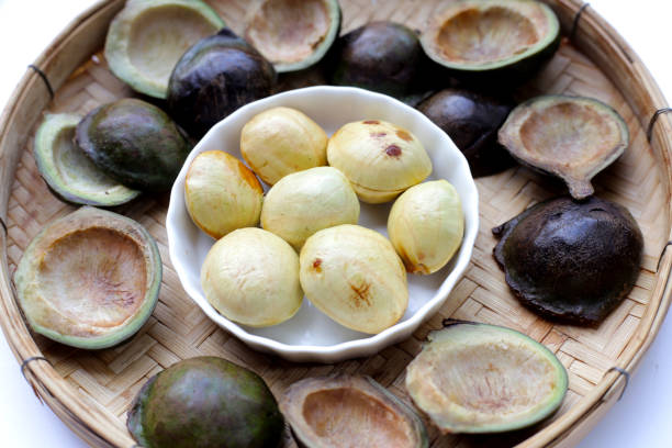 istock Djenkol fruit bean in bamboo weave plate 1745272598