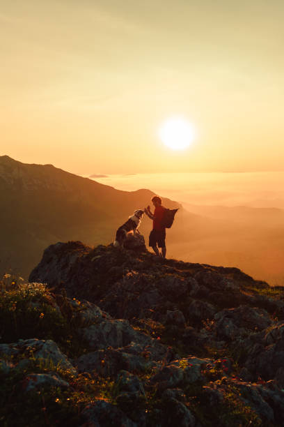 istock man with his dog hiking 1745275993